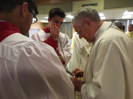 FatherFredPreparesForMassMay19